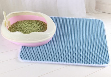 Waterproof cat litter mat in use with a cat blue