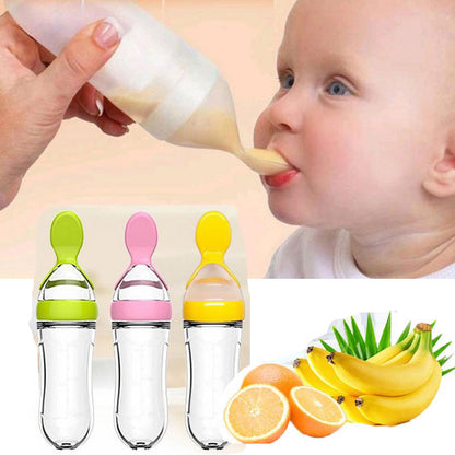 Baby feeding bottle with spoon